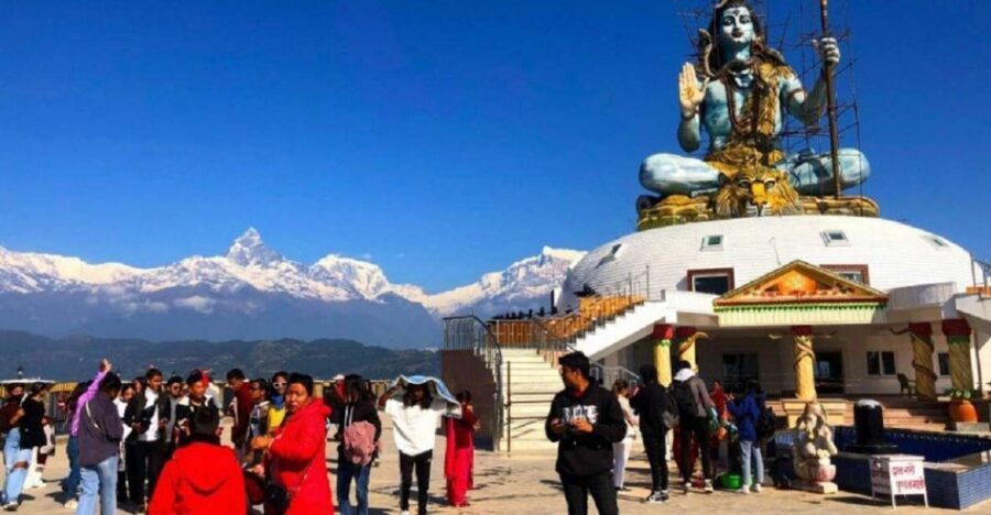 From Pokhara: Guided Day Jungle Hiking Tour with Boat Ride - Pumdikot Shiva Statue Area: Temple Steps and Wide Annapurna Views